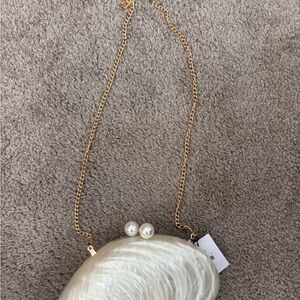 AKIRA Pearl Shell Crossbody Clutch in Ivory with Gold Chain